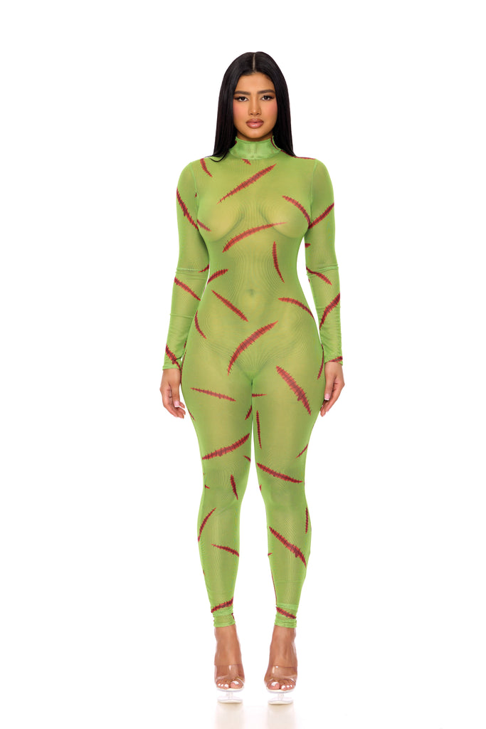 Monster Mesh Jumpsuit with Frankenstein Design, featuring a sheer mesh, mockneck, and zipfront, worn by a woman, showcasing its unique monster-inspired style.