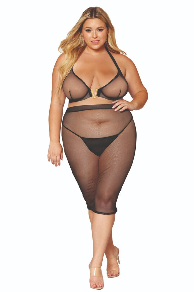 Woman modeling Edgy Curvy Stretch Fishnet Skirt Lingerie Combo, featuring a stretch fishnet bra with underwire and matching midi-length slip skirt with gold zipper.