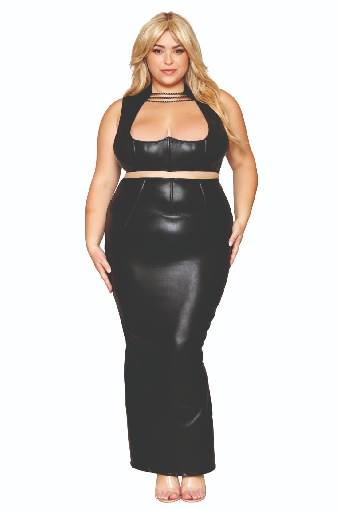 Woman modeling the Curvy Faux Leather Harness Bra & Long Skirt Set, featuring black chain details, a halter-style bra, and a waist corset.