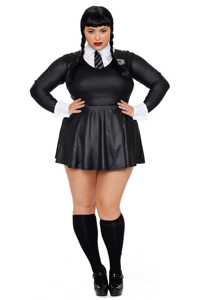 Woman in a black dress with contrast cuffs and school crest, wearing black high-heeled shoes, showcasing the Dark Scholar Plus Size Rebel Costume's Gothic schoolgirl design.