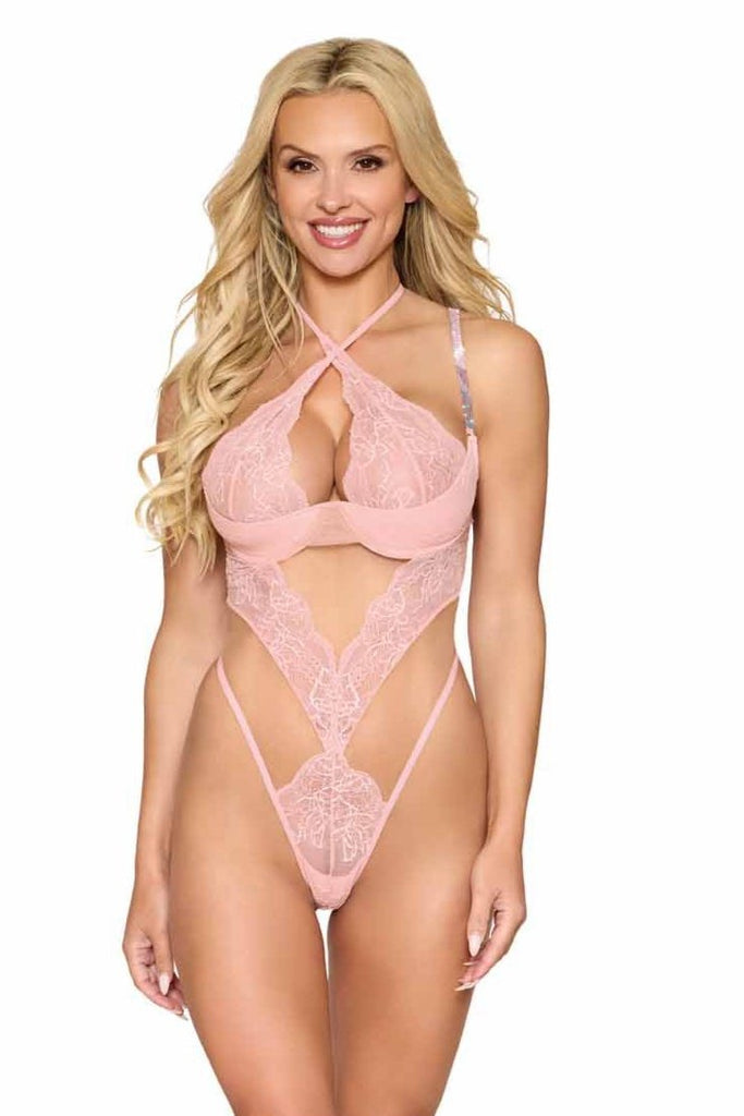 Elegant rose lace high cut teddy lingerie on a model.