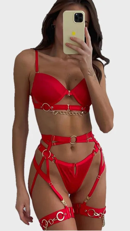 Woman taking a selfie wearing the 3-Piece Lingerie Set, featuring a sensual design with chain decorations and sequined details for a gothic erotic look.