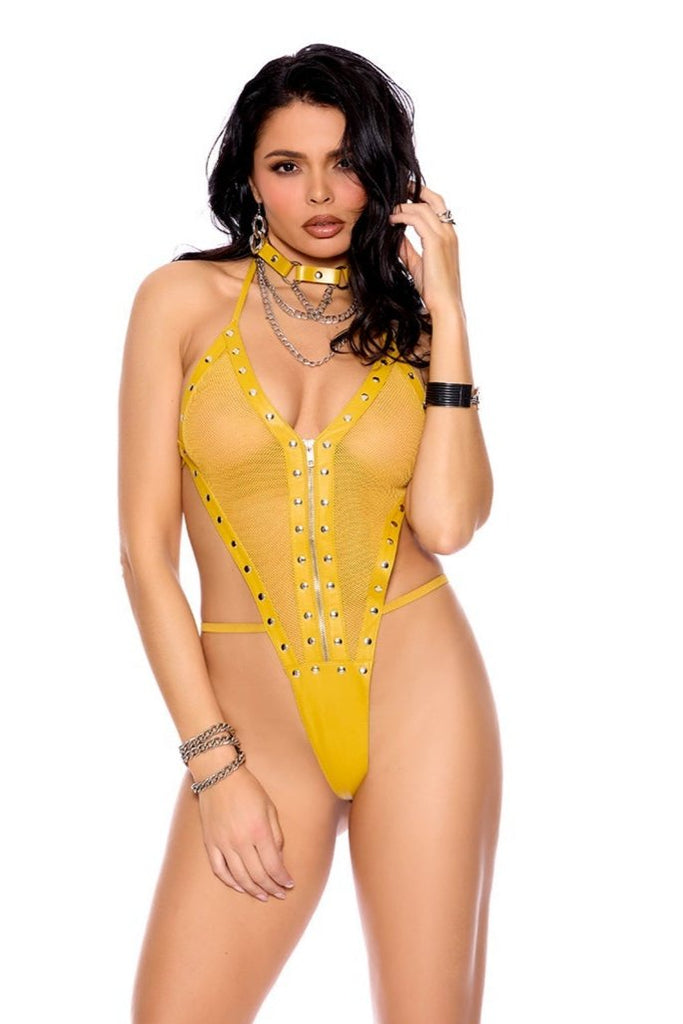 Seductive yellow leather and fishnet teddy with studs and chains.