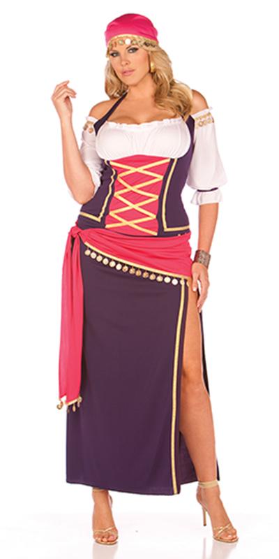 Sexy Plus Size Fortune's Told Gypsy Costume featuring an off-shoulder halterneck top, thigh-split maxi skirt, coin sash, headscarf, and bracelets, worn by a woman.